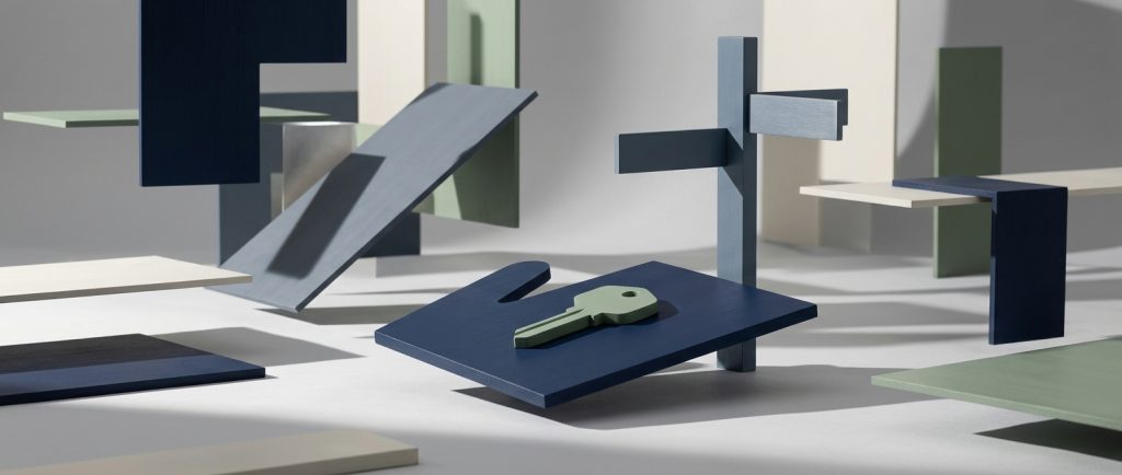 Domain registration and DNS management A sage key resting on an open navy platform tilted toward the viewer, with a slate signpost behind, representing a domain held in your name and records pointed where you choose.