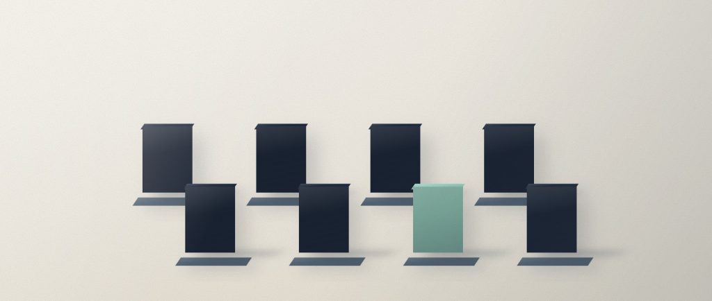 Nine small navy uprights standing on their own separate bases in an even field, one of them sage.